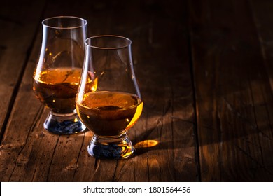 Scotch Whiskey Without Ice In Glass, Rustic Wood Background, Copy Space