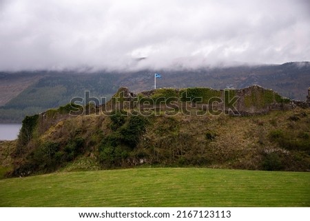 Scotish flag over Urquhart Castle, Loch Ness 