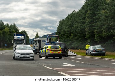 SCOTLAND - AUGUST 8, 2019: The Serious Car Crash On A Scottish Road With A Police Already Investigating The Traffic Accident