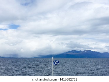 Scotland Flag On Sea With Mountain