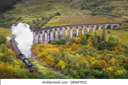 Scotland, Jacobite Steam Train And Green Landscape