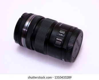 Scotland, UK - May 2012 : 12-50mm Macro Lens From Olympus For The Micro Four Thirds System On A Plain White Background. Custom Function Buttons On Lens With Power Zoom Ring.