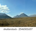 Scottish highlands dry grass blue sky cloud stunning