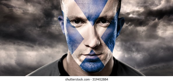 Scottish rugby player against blue sky - Powered by Shutterstock