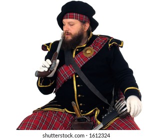 Scottish Warrior In The Medieval Uniform