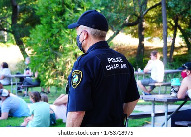 Scotts Valley, California, USA. June, 6th, 2020. The Scotts Valley Police Chaplain Listening To People Exercising Their First Amendment Rights During A Peaceful March And Protest In Santa Cruz County.