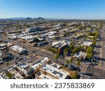 Scottsdale city center aerial view on Scottsdale Road at Indian School Road at the background in city of Scottsdale, Arizona AZ, USA. 