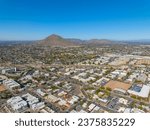 Scottsdale city center aerial view on Scottsdale Road at Main Street with Camelback Mountain at the background in city of Scottsdale, Arizona AZ, USA. 