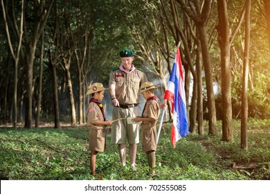 Scout And Boy Scout Leader, Teacher Holding Thai Flag 