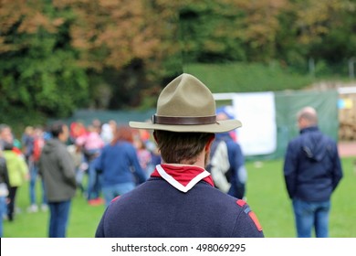 Scout Leader At The Gathering In Uniform With Hat And Neckclothred And White