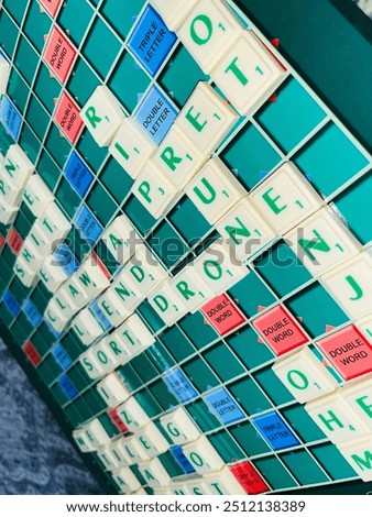 Scrabble board playing game. Create words and play game.