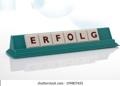 Scrabble tiles forming the single word success