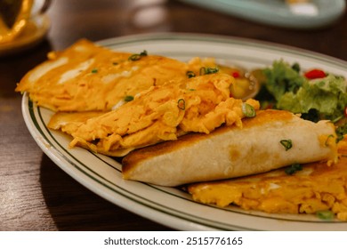 Scramble eggs with cheese, herbs and tomatoes in pita bread close-up. Delicious meals with vegetables. The concept of a vegetarian lunch - Powered by Shutterstock