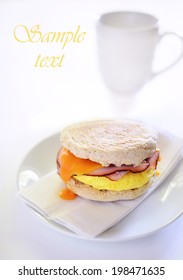 Scrambled Egg, Black Forest Ham And Cheddar Cheese On A Whole Wheat English Muffin