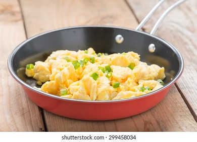 Scrambled Egg In A Frying Pan.