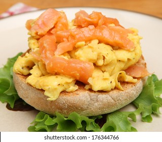 Scrambled Egg And Smoked Salmon On Toasted English Muffin.