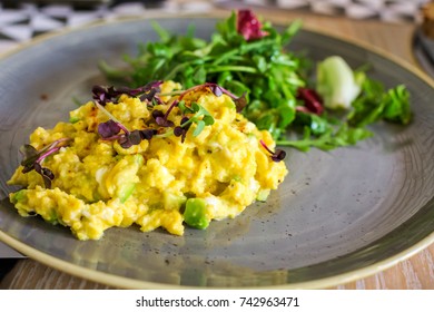 Scrambled Eggs With Avocado And Rocket Salad