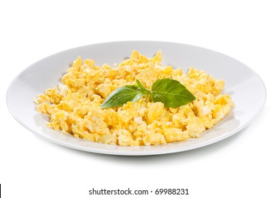 Scrambled Eggs With Basil On White Background