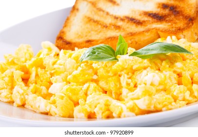 Scrambled Eggs With Green Basil And Toast