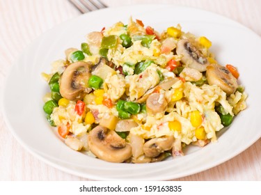 Scrambled Eggs With Mushrooms And Vegetables