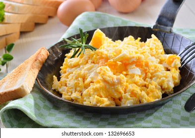 Scrambled Eggs With Toast, Served In A Pan