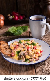 Scrambled eggs with tomatoes and spinach