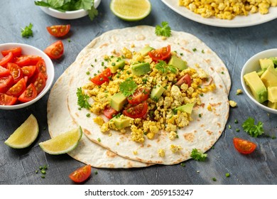 Scrambled Tofu Tacos With Avocado, Tomatoes And Green Herbs. Healthy Vegan Breakfast.