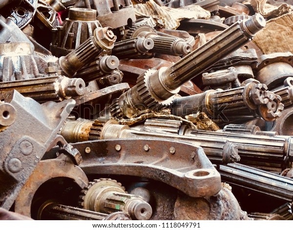 Scrap Car and machinery Parts. Scrap parts in
garage wall. Scrap parts removed from used cars and machinery.
Parts isolated from the unused car and machinery. Scraps for second
used part shop.