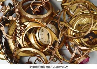 A Scrap Of Gold. Old And Broken Jewelry, Coins, Watches Of Gold And Gold-plated 