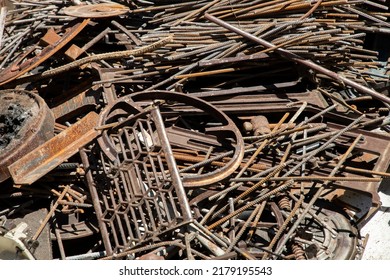 scrap iron and scrap metal, waste and garbage on a junkyard - Shutterstock ID 2179195543