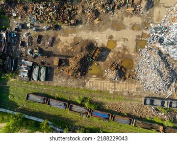 Scrap Metal Recycling. Aerial View of Industrial Scrap Processing. Junkyard Background. Metal, aluminum, copper. Recycling with heavy equipment. 