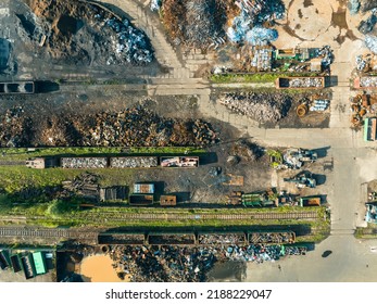 Scrap Metal Recycling. Aerial View of Industrial Scrap Processing. Junkyard Background. Metal, aluminum, copper. Recycling with heavy equipment. 