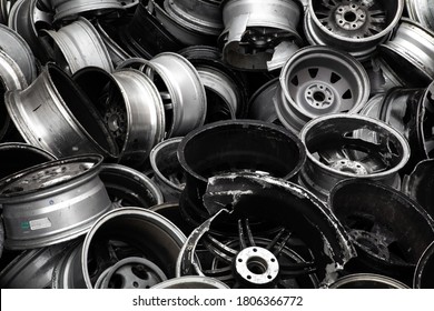 A scrap of old aluminum wheels from a recycling company for the purpose of wallpaper or background. - Powered by Shutterstock