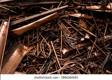 A scrap of an old wired and sheet copper material from a recycling company in the purpose of wallpaper and background - Shutterstock ID 1806360655