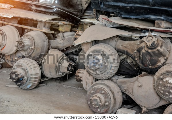 Scrap yard for recycle the engine and\
automotive parts. Engine junkyard. That old, cracked engine block.\
Metal recycling yard. Scrap metal recycling\
yard
