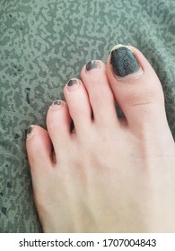 Scraped Nail Polish Feet. Chipped Nails