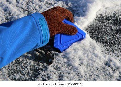 Scraping Ice Off The Windshield