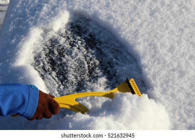 Scraping Ice Off The Windshield