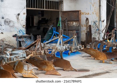 Scrapped Metal Garbage Or Second Hand Agricultural Tools

In Front Of Shop