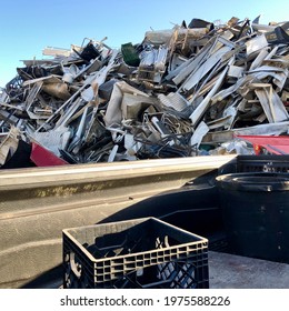 scrappers,recyclers, sell scrap metal at recycling facility for cash - Powered by Shutterstock