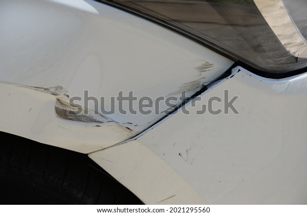 a scratch in a body of a car, Alicante province,\
Spain, July 2021