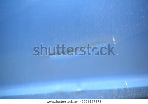 a scratch in a body of a car, Alicante province,\
Spain, July 2021