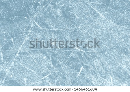 Scratched frozen ice texture with scratches from skates