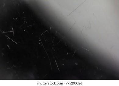 Scratched Glass Background Surface. Black Color Texture