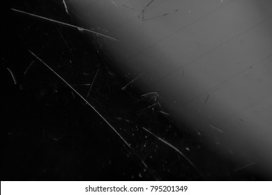 Scratched glass background surface. Black color texture