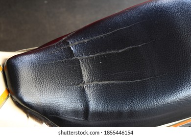 Scratched At The Leather Of  Motorcycle Saddle Or Seat. 