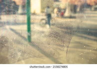 Scratched Mirror. Damaged Surface Of Glass. Dirt In Display Case. Window Details. Murky Reflection.