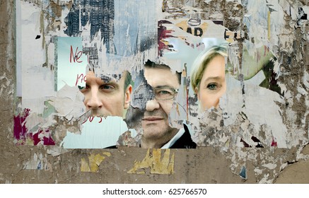 Scratched Posters In The Streets, Paris April 21, 2017 - French Elections - With Marine Lepen, Jean-luc Mélenchon, Emmanuel Macron
