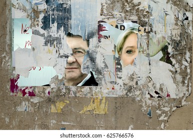 Scratched Posters In The Streets, Paris April 21, 2017 - French Elections - With Marine Lepen And Jean-luc Mélenchon