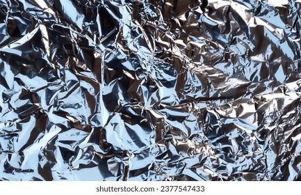 Scratched texture.Dust overlay. Silver Crushed foil.Weathered steel effect. Silver gray shiny glossy wrinkled aged distressed metallic film overlay.Foil with a shiny mint surface for the background.  - Shutterstock ID 2377547433